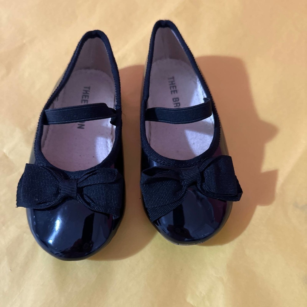 Thee bron black patent leather flats